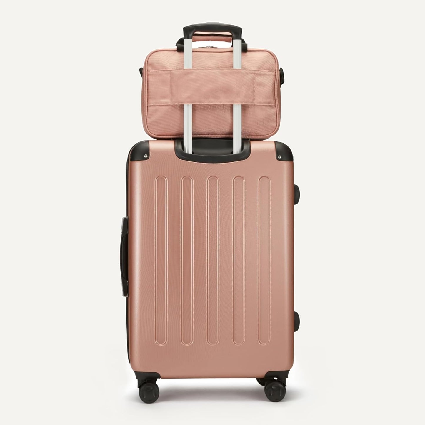 Amazon Basics 4-Piece Luggage Set, Including Two Hardside Suitcases With Multi-directional Spinner Wheels (22" Carry-On and 28" Checked), 15" Tote Bag and 10" Compact Travel Bag, Rose Gold