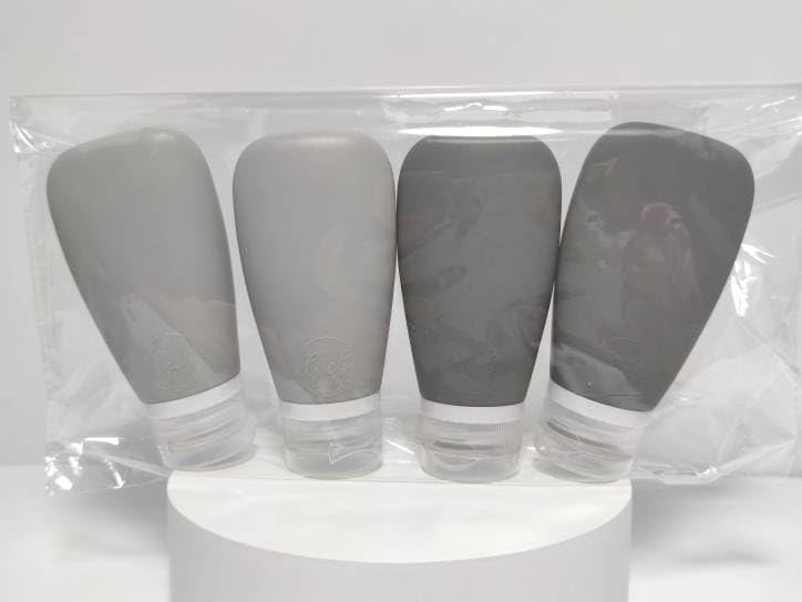 Travel Bottles for Toiletries, TSA Approved 3oz Leak Proof Silicone Soft Refillable Squeeze Travel Size Containers BPA Free for Cleansers, Lotions, Shampoo, Conditioner 4pk (2Black-2Gray)