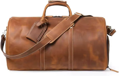 Mullis Mercantile Leather Weekender Travel Bag, a timeless classic. This vintage leather duffle bag is perfect for airline carry on, full-grain leather, a retro design, gym, and a YKK zipper in brown.