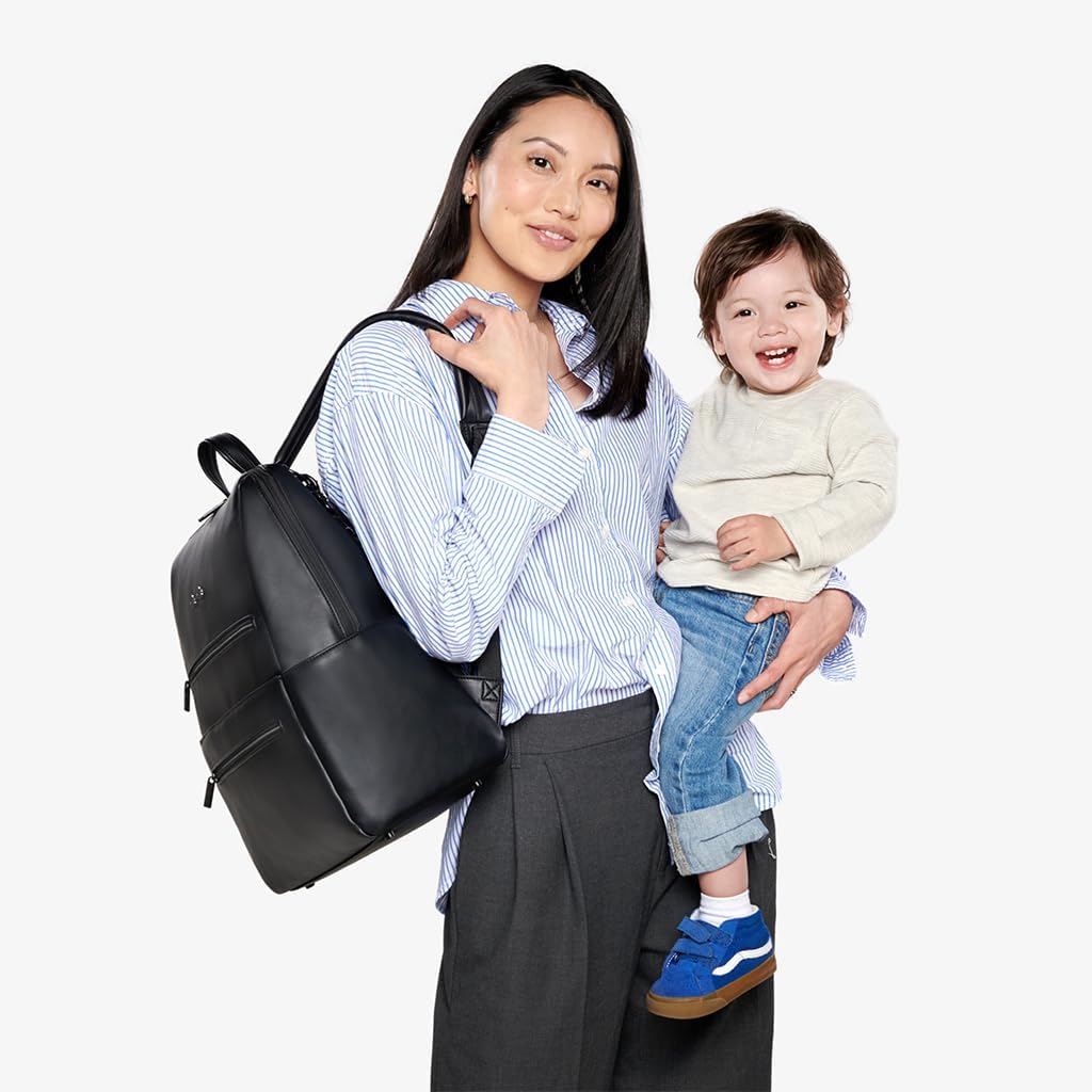 Itzy Ritzy Eras Diaper Bag Backpack – Large Capacity Sleek Daddy Diaper Bag for Men Featuring Neutral Design, 15 Pockets, Changing Pad, Stroller Straps, and Comfortable Backpack Straps, Black