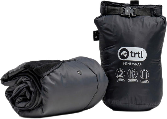 trtl Mini Wrap Compact Travel Blanket - Quilted Insulation - Convenient, Packable Blanket - Comes with Roll-Top Bag - Features a Secure Pocket