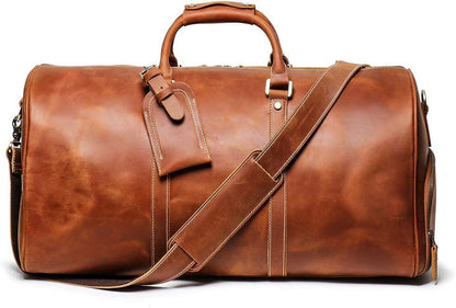 Mullis Mercantile Leather Weekender Travel Bag, a timeless classic. This vintage leather duffle bag is perfect for airline carry on, full-grain leather, a retro design, gym, and a YKK zipper in brown.