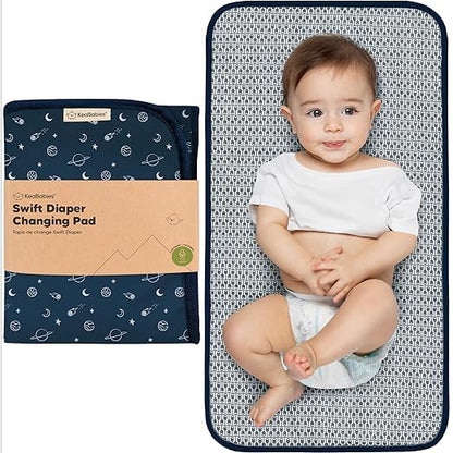 KeaBabies Portable Diaper Changing Pad, Easy Wipe Clean - Foldable Waterproof Baby Changing Mat for Diaper Bag, Compact, Lightweight, 25x13 Baby Changer Travel Essential, Machine Washable (Planets)