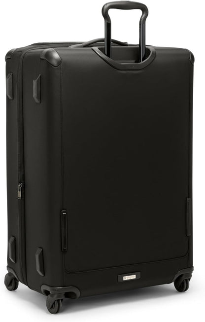 TUMI - Voyageur Leger 4 Wheeled Luggage - Women's Lightweight and Spacious, Sleek Silhouette, Durable Premium Suitcase - 29" Extended Trip Expandable Packing Case, Black with Gunmetal Hardware