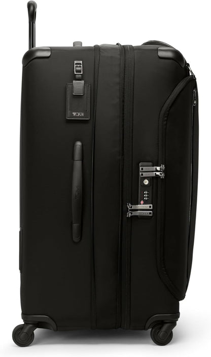 TUMI - Voyageur Leger 4 Wheeled Luggage - Women's Lightweight and Spacious, Sleek Silhouette, Durable Premium Suitcase - 29" Extended Trip Expandable Packing Case, Black with Gunmetal Hardware