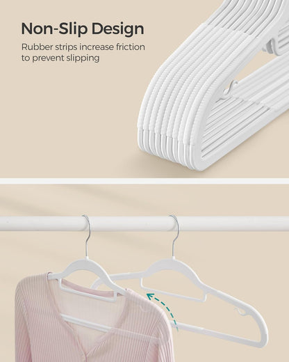 SONGMICS Pack of 50 Coat Hangers, Space-Saving Plastic Clothes Hangers, Non-Slip, 0.2 Inches Slim, 16.5 Inches Wide, 360° Swivel Silver Hook, White UCRP20WT50