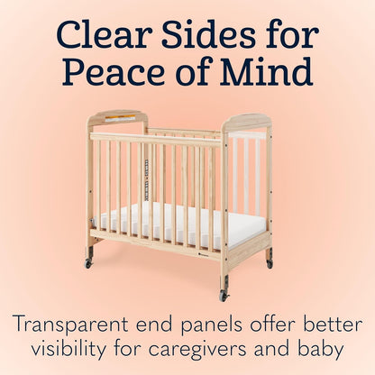 Foundations Serenity Compact Daycare Crib, Fixed Side, Features Mirrorview End Panels and Slatted Side Panels, Durable Wood Construction, Includes 3” InfaPure Foam Mattress (Natural)