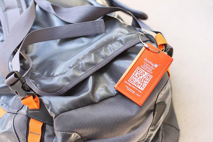 Dynotag® Web Enabled Smart Aluminum Convertible Luggage ID Tag + Braided Steel Loop, with DynoIQ™ & Lifetime Recovery Service (Electric Orange)