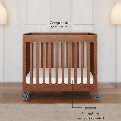 Foundations Boutique Folding Mini Baby Crib - Compact, Portable, Wooden Hotel Crib, Foldable Mini Crib for Baby & Toddlers - Includes 3" Foam Mattress, Cherry