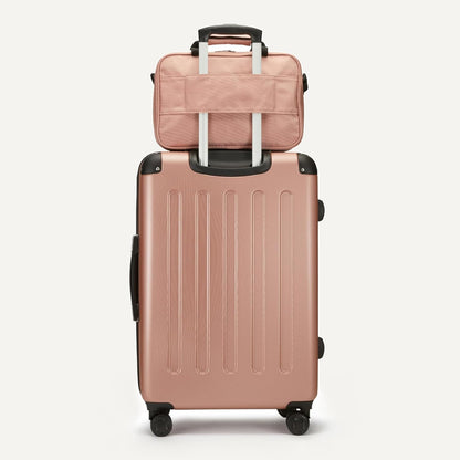 Amazon Basics 4-Piece Luggage Set, Including Two Hardside Suitcases With Multi-directional Spinner Wheels (22" Carry-On and 28" Checked), 15" Tote Bag and 10" Compact Travel Bag, Rose Gold