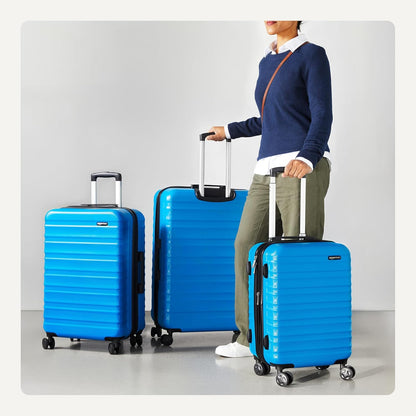Amazon Basics 3-Piece Set (21", 26", 30"), Hardshell Suitcases With Wheels, Expandable For Up to 25% More Space, With Scratch-Resistant Surface, Four Multi-directional Wheels, Light Blue