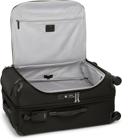 TUMI - Voyageur Leger 4 Wheeled Luggage - Women's Lightweight and Spacious, Sleek Silhouette, Durable Premium Suitcase - 29" Extended Trip Expandable Packing Case, Black with Gunmetal Hardware