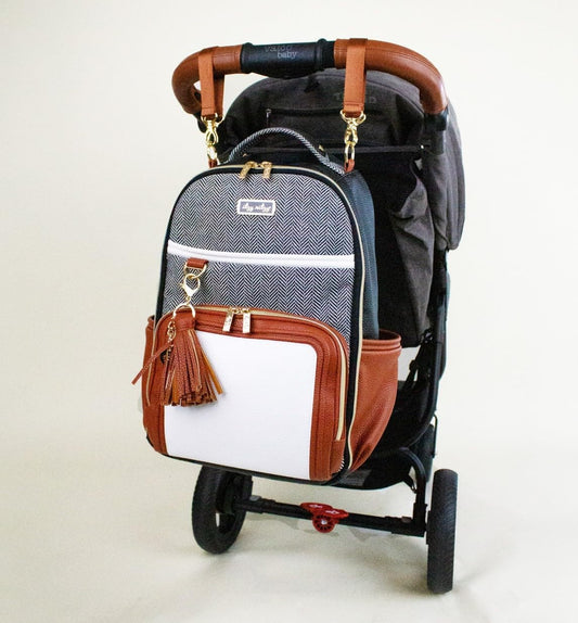 Itzy Ritzy Diaper Bag Backpack – Large Capacity Boss Plus Baby Backpack Diaper Bag Featuring 19 Pockets, Changing Pad, Stroller Clips, and Comfortable Straps (Coffee & Cream)