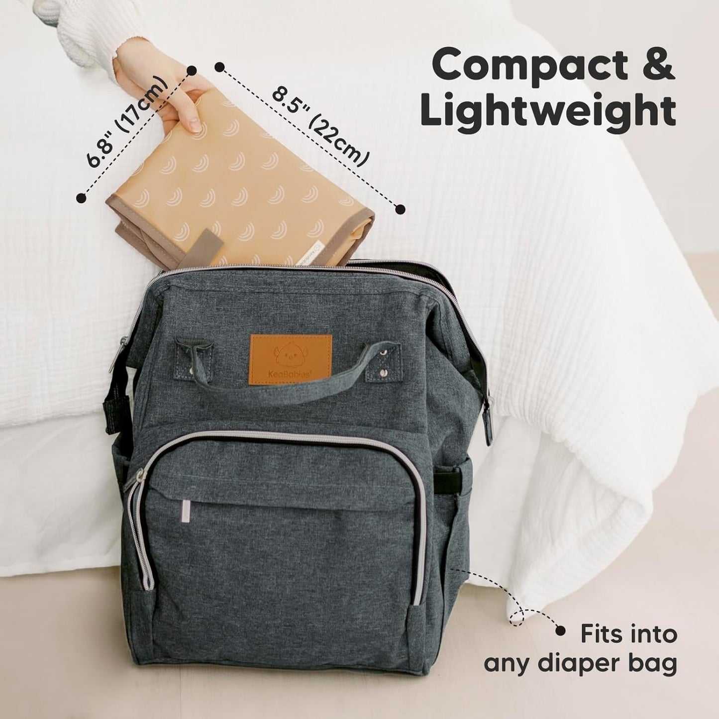 KeaBabies Portable Diaper Changing Pad, Easy Wipe Clean - Foldable Waterproof Baby Changing Mat for Diaper Bag, Compact, Lightweight, 25x13 Baby Changer Travel Essential, Machine Washable (Rainbow)