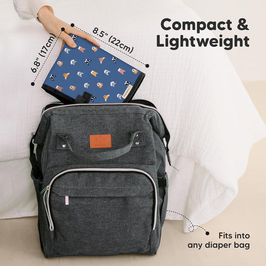 KeaBabies Portable Diaper Changing Pad, Easy Wipe Clean - Foldable Waterproof Baby Changing Mat for Diaper Bag, Compact, Lightweight, 25x13 Baby Changer Travel Essential,Machine Washable(Pets & Paws)
