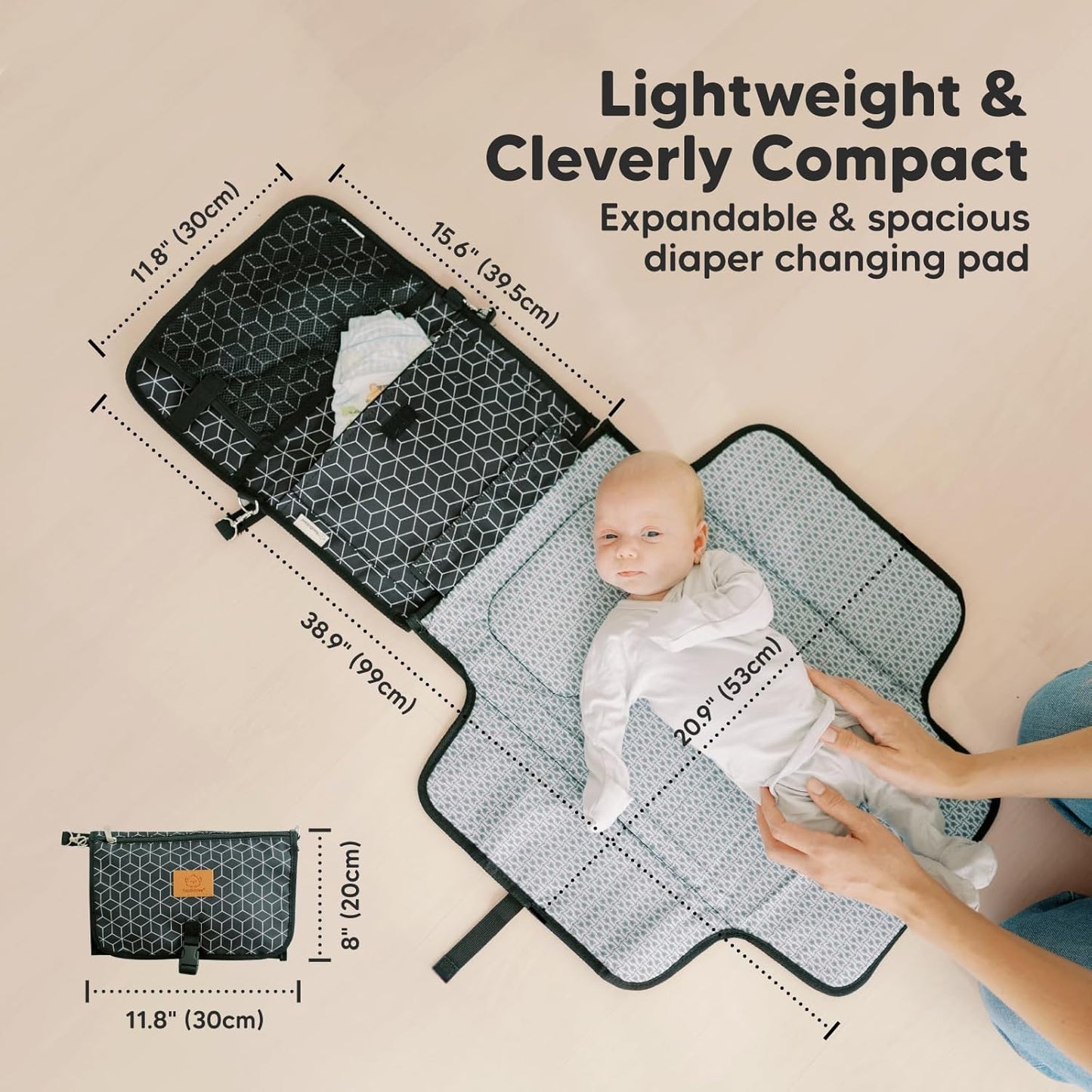 KeaBabies Portable Diaper Changing Pad - Large Waterproof Baby Changing Mat, Compact Travel Diaper Clutch, Functional Pockets Fit Newborn Essentials, Wipeable & Padded Baby Changer (Black Geo)