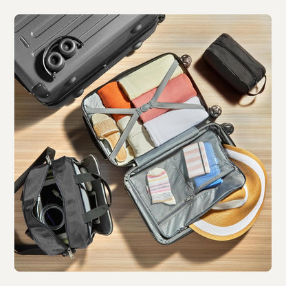 Amazon Basics 4-Piece Luggage Set, Including Two Hardside Suitcases With Multi-directional Spinner Wheels (22" Carry-On and 28" Checked), 15" Tote Bag and 10" Compact Travel Bag, Black