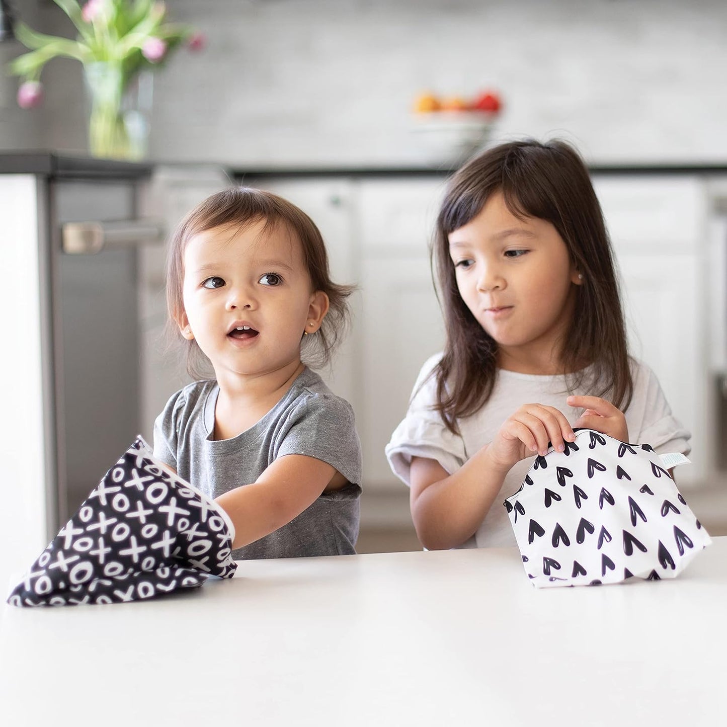 Bumkins Reusable Sandwich and Snack Bags, for Kids School Lunch and for Adults Portion, Washable Fabric, Waterproof Cloth Zip Bag, Travel Pouch, Food-Safe Storage, Large 2-pk Hearts and XOXO