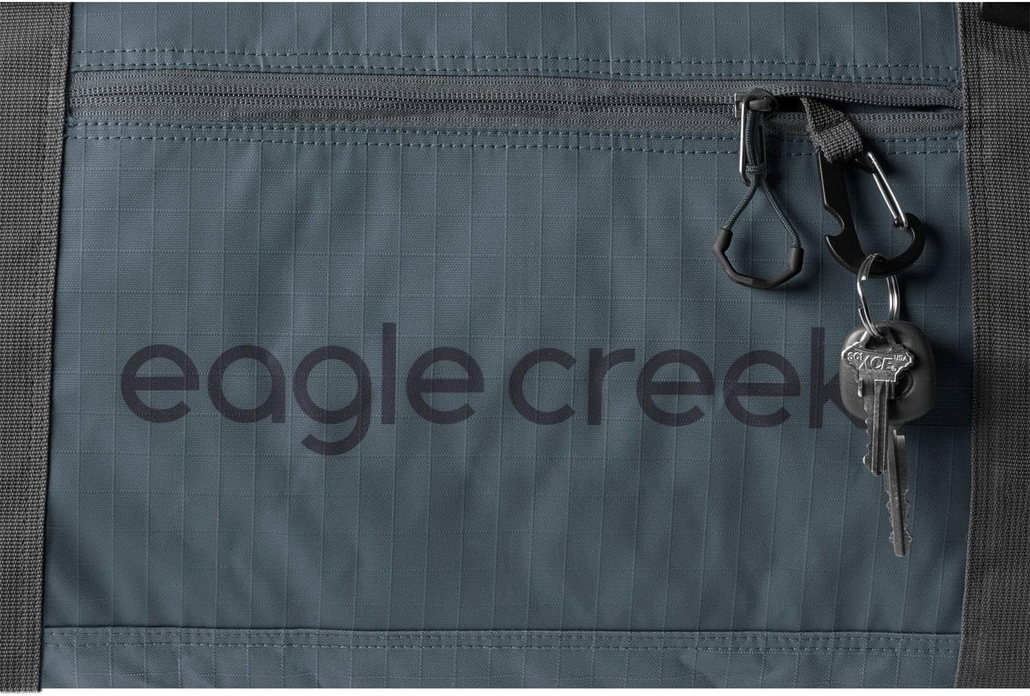 Eagle Creek No Matter What Rolling Duffel - Durable Rolling Bag for Travel - Adjustable Shoulder Strap - Heavy Duty Wheels - Lockable Zippers - Multiple Carry Options - 110L - Smoke