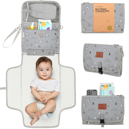 KeaBabies Portable Diaper Changing Pad - Large Waterproof Baby Changing Mat, Compact Travel Diaper Clutch, Functional Pockets Fit Newborn Essentials, Wipeable & Padded Baby Changer (Woodland)
