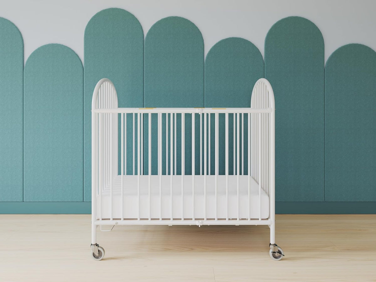 Foundations Pinnacle Folding Metal Baby Crib - Portable Hotel Crib, Easy Compact Storage, 4" Mattress, Built for Small Spaces, Heavy-Duty Construction, White