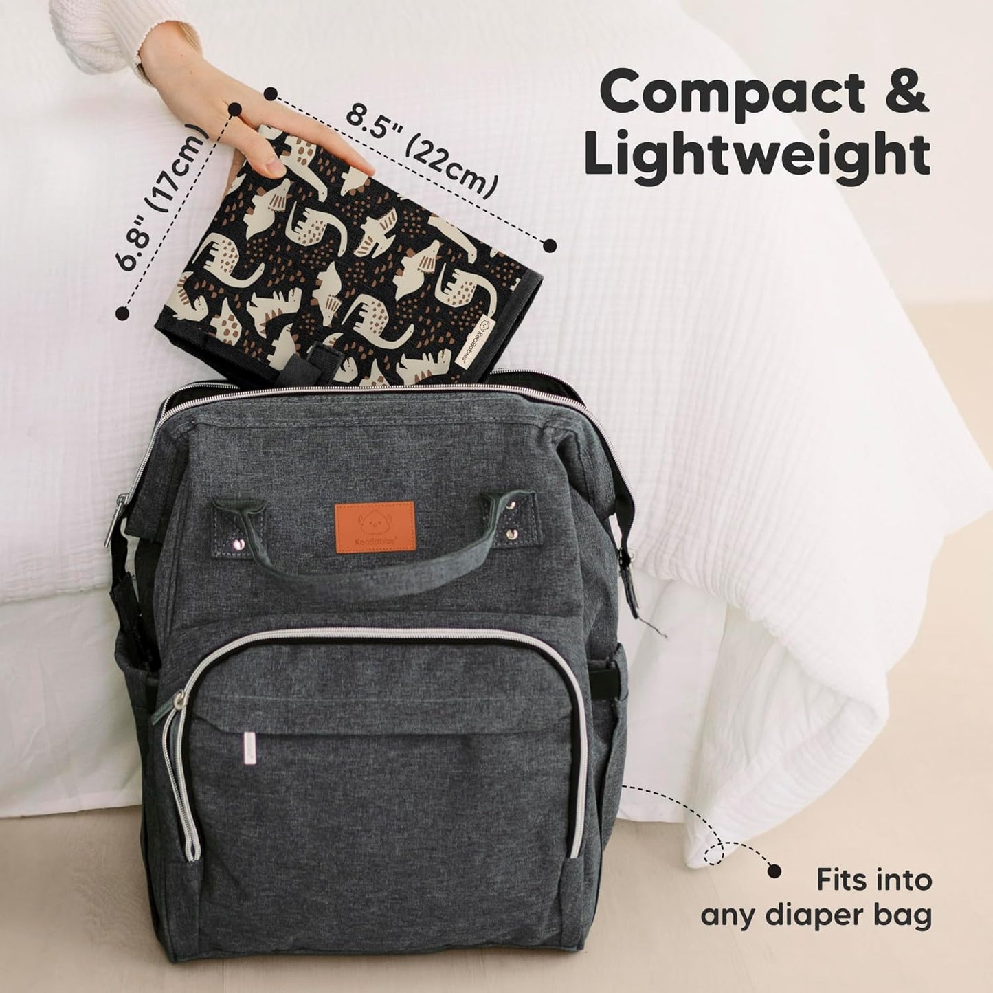 KeaBabies Portable Diaper Changing Pad, Easy Wipe Clean - Foldable Waterproof Baby Changing Mat for Diaper Bag, Compact, Lightweight, 25x13 Baby Changer Travel Essential, Machine Washable (Dino Ridge)